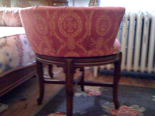 Restored & Reupholstered antique swivel chair.