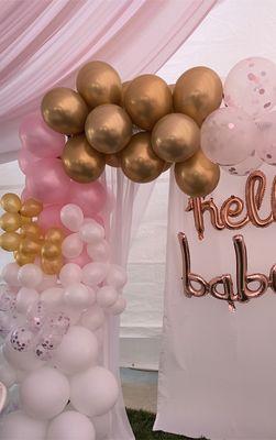 Baby shower balloon and dessert table.