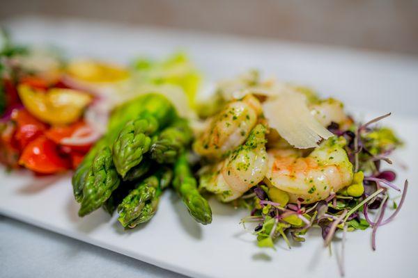 Herb Roasted shrimp salad with asparagus and fire roasted tomatoes