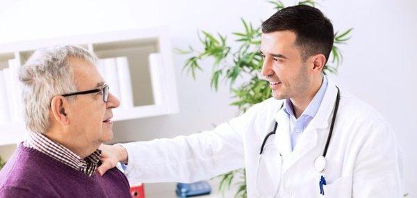 Doctor speaking with patient about erectile dysfunction