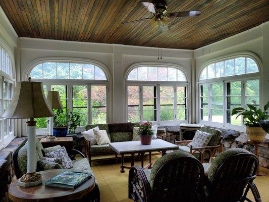 Sunny porch, great for a glass of wine or coffee and a good book.