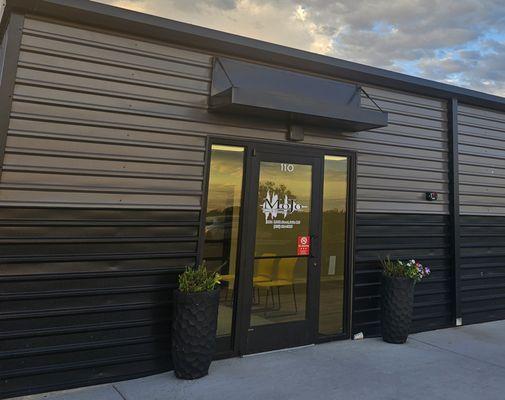 Patient entrance is between flower planters