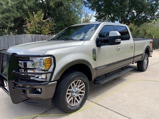 Hand wash, blow dry, hand wax, wheels cleaned/tire shine, leather cleaned/conditioned, wheels mats cleaned