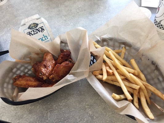 Chicken wings and fries