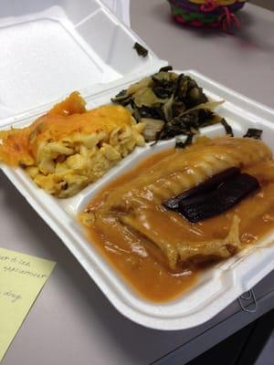 Smothered turkey wings with dressing; Mac and cheese; cabbage and collard mix