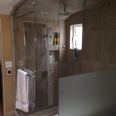 Palo Alto, Ca  Custom built steam shower with operable tilt steam vent and sand blasted privacy wall