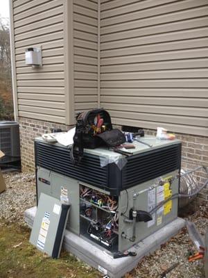 Service and inspection of high efficiency HVAC unit