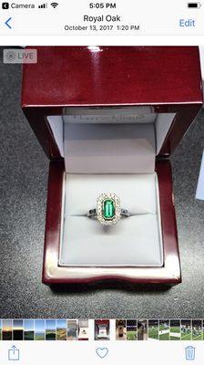 Magnificent Colombian Emerald  with a halo of Diamonds