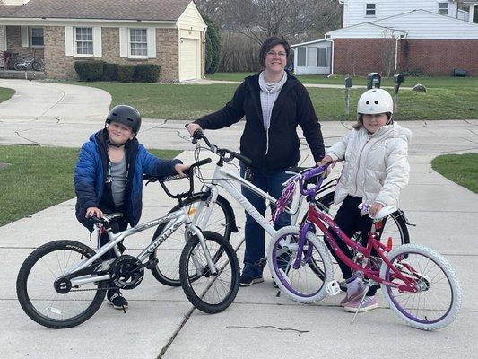 Happy kids and their momma with their new bikes!