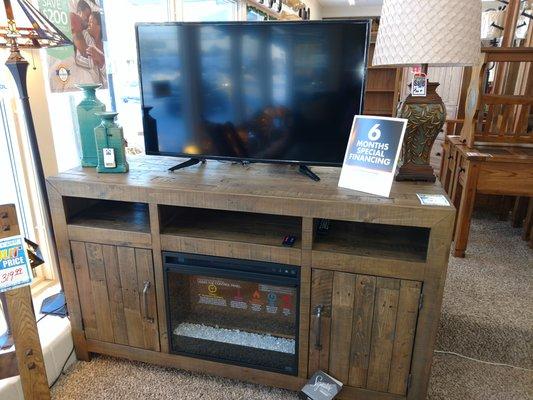 Ashley entertainment center with available fireplace option