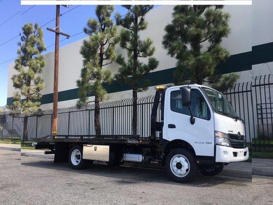 2018 Hino 195 with Dual-Tech Low Profile Carrier.