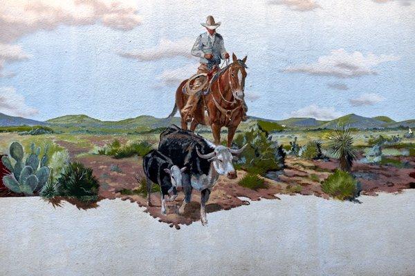 Alpine Mural of cowboy herding