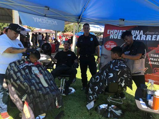 Back to School Event Madera CA.  Madera PD  Owner/Barber Carlos G. Barber Matt G. Barber Ana M.