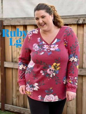 This floral Ruby is an amazing top
Lightweight which makes it perfect for all year round. 

True to size