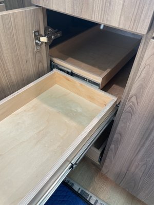 Pull out and a hidden pull out shelf! Great work