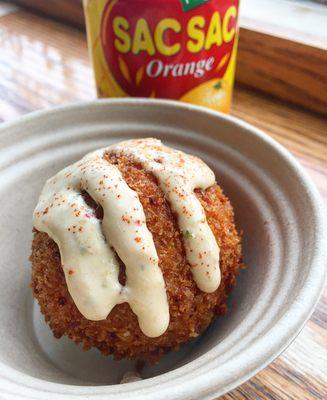 FLAMING BALL : Spicy pork, cheese, & kimchi rolled in rice; breaded & fried