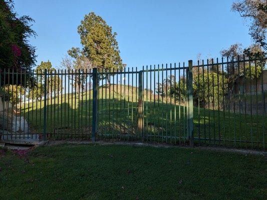 Park is behind the gate, which I couldn't find a way through or around