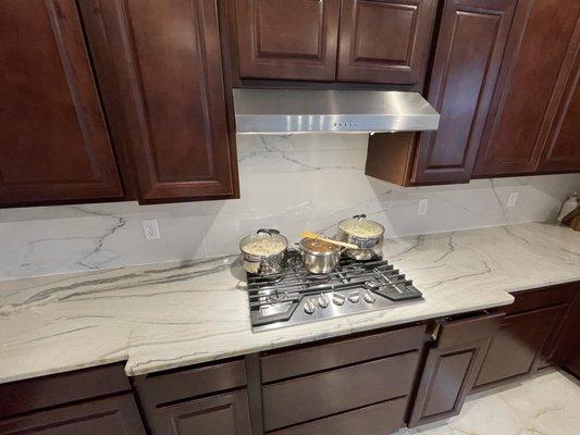 Full kitchen marble installation, backsplash, and floor tile installation result