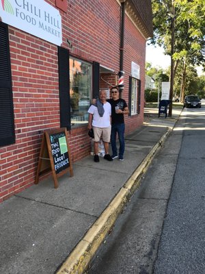 Outside the barber shop