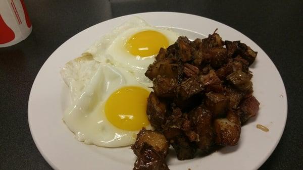 Daily Breakfast Special: 2 eggs and corned beef hash