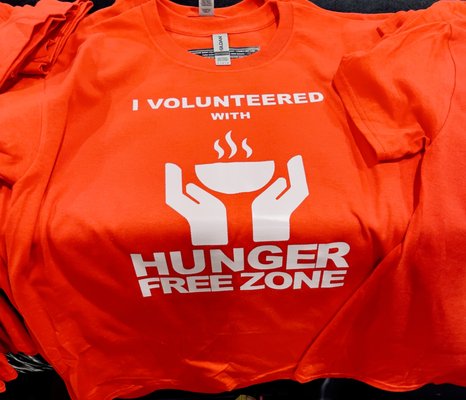 Hunger free zone t-shirts Printed and Designed By Feeding Art.