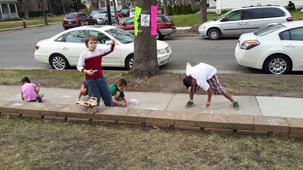 Creative Kids taking the chalk to the sidewalk and bricks!