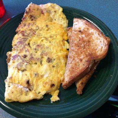 Omelette with sausage, bacon, & cheese.  This meal also comes with toast and home fries (but I gave the potatoes away!)