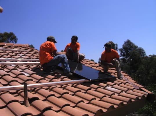 Unique Solar crew at work installing a residential solar system in San Diego