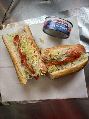 Our delicious tuna hoagie, made with nearly two full cans of tuna! Stop by, order online, or give us a call!