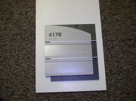 Laminate ADA signage with window inserts