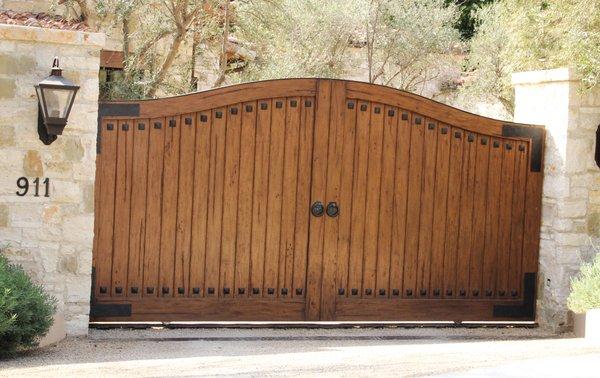 Custom Exotic Hardwood Single Sliding Auto Gate with accented with Hand Hammered Cast Iron