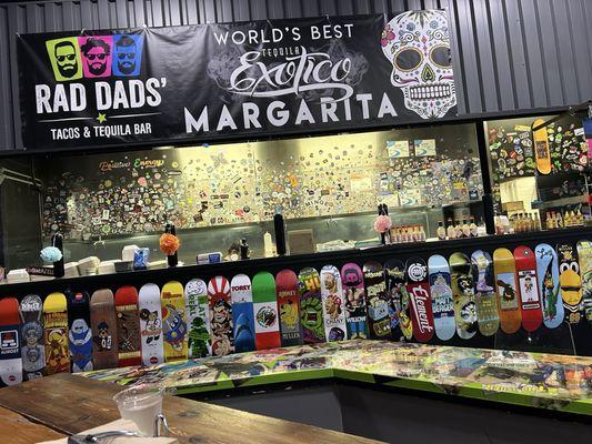 View of the kitchen and skate board wall