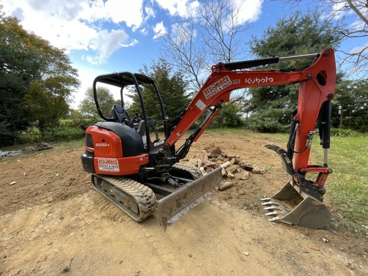 Kubota KX033 mini excavator with thumb for rent. Available with a 18" or 24" Bucket.