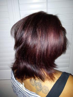 Dark violet/copper all-over-color service using Redken Cover fusion for her roots & Redken Shades eq Gloss on her mid length to ends.