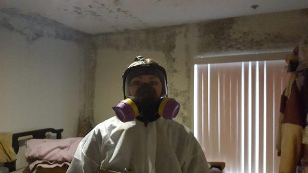 Our mold inspector in full personal protective equipment