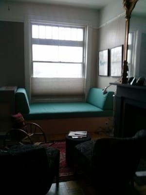 Here is another iteration of the couch with the back cushions leaning against the wall. We love our window couch.