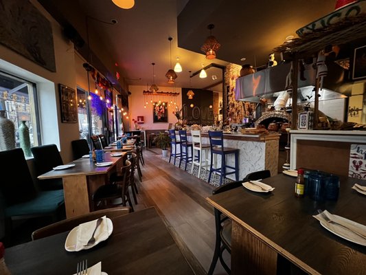 Front seating area by the bar. Would soon be filled with diners.