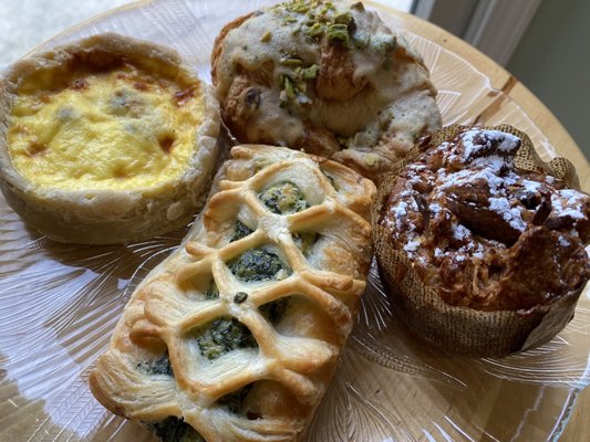 Mushroom quiche, spinach and feta croissant, almond croissant, chocolate bread pudding