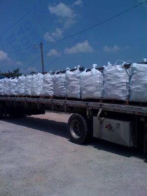 Our bags holding wood blocks on a flat bed