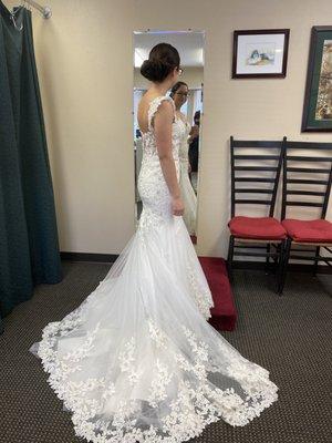 The wedding dress shoulders, and let out the sides.