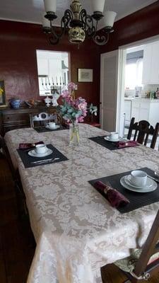 The Garden Cottage B&B, LA. Dining room, kitchen in background