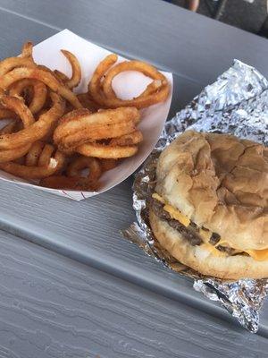 Cheeseburger and curly fries.