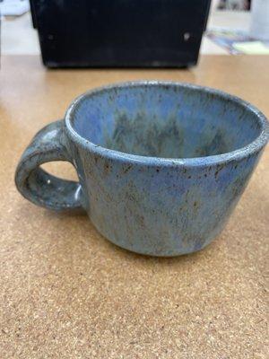 A finished tea cup that turned out smaller than expected. A piece from my 4 week wheel throwing course