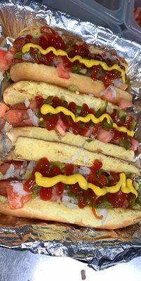 Mexican Hotdog comes with mayo, tomatoes, onions, jalapeños, ketchup and mustard!