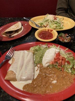 Chicken chimichanga (front), steak taco, chalupa (back)