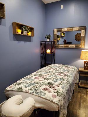 Our massage and acupuncture room is cozy and serene.