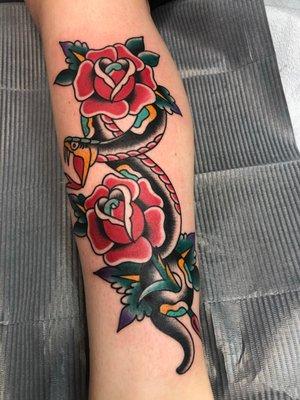 Snake and roses by Tim