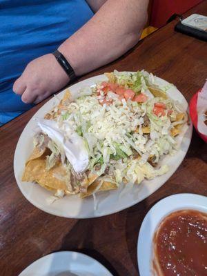 Wife went with steak and chicken nachos, she said they were exactly what you wanted for nachos. Lots of meat, lots of cheese.