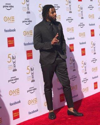 Music artist Sage Gemini sporting our signature tuxedo- at the 50th NAACP Awards. OMC Formal from head to toe actually!