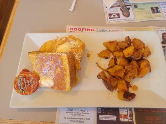 Short stack challah French toast and home fries.